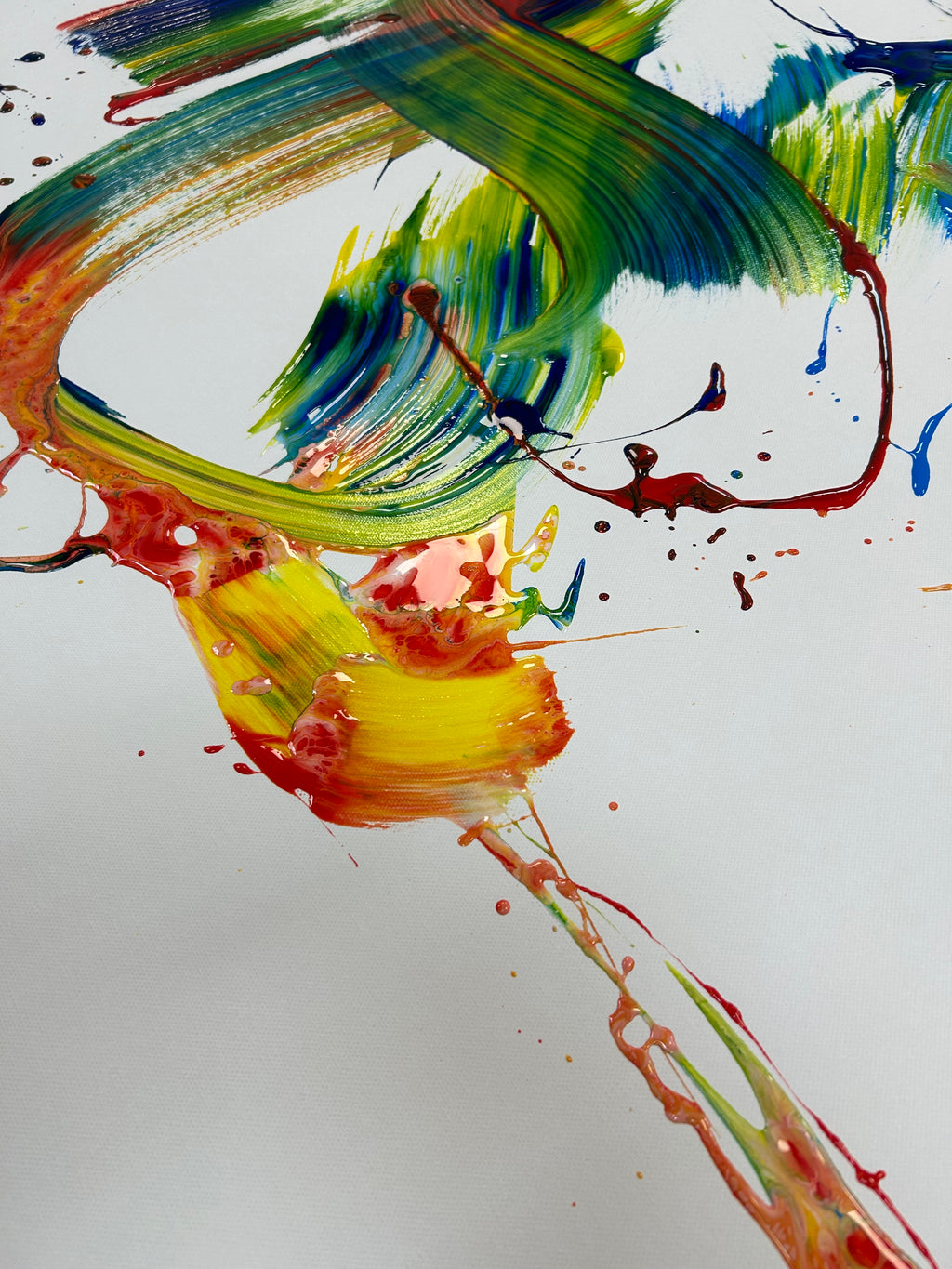 Abstract painting with vibrant colors on a white background