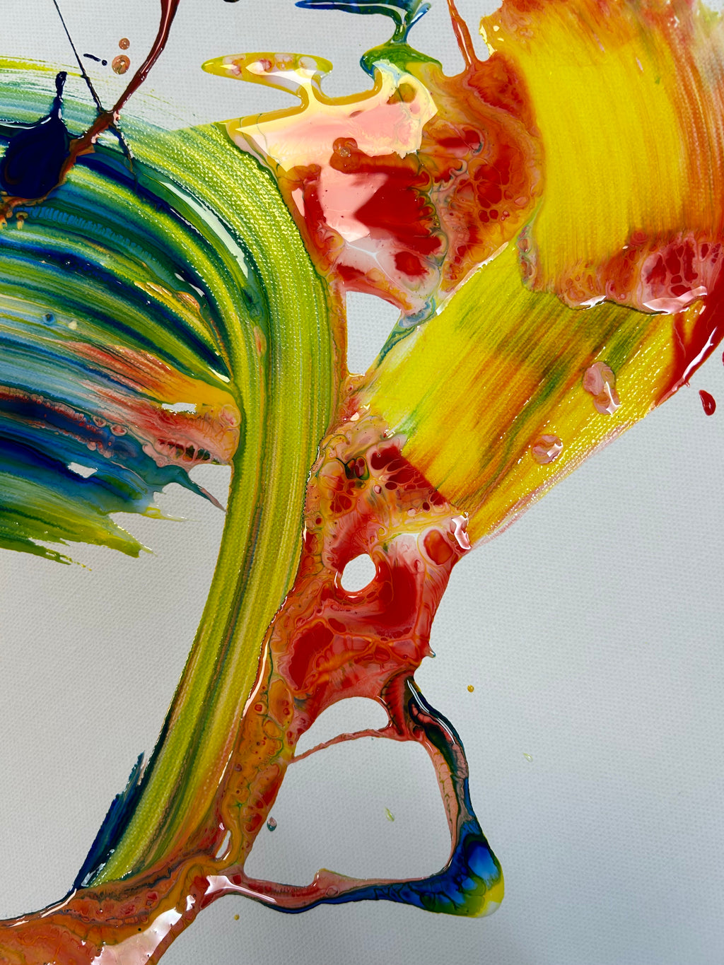 Abstract painting with vibrant colors on a white background