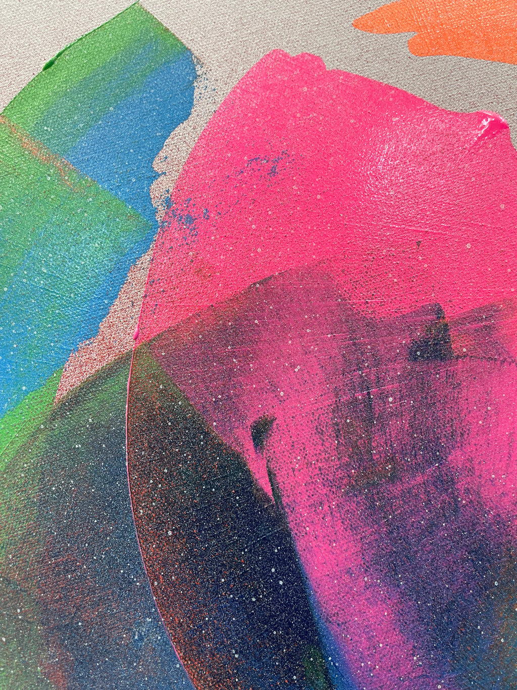 Abstract art with colorful brush strokes on a textured surface